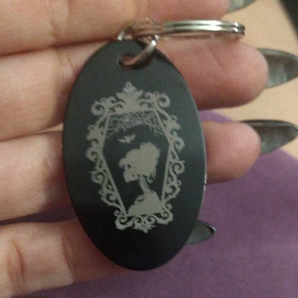 Elegant Black Keychain with Intricate Design